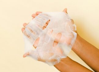 Person Holding A Face Mask
